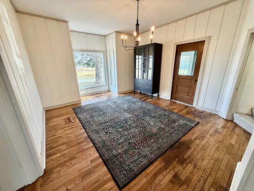 hardwood floor with area rug